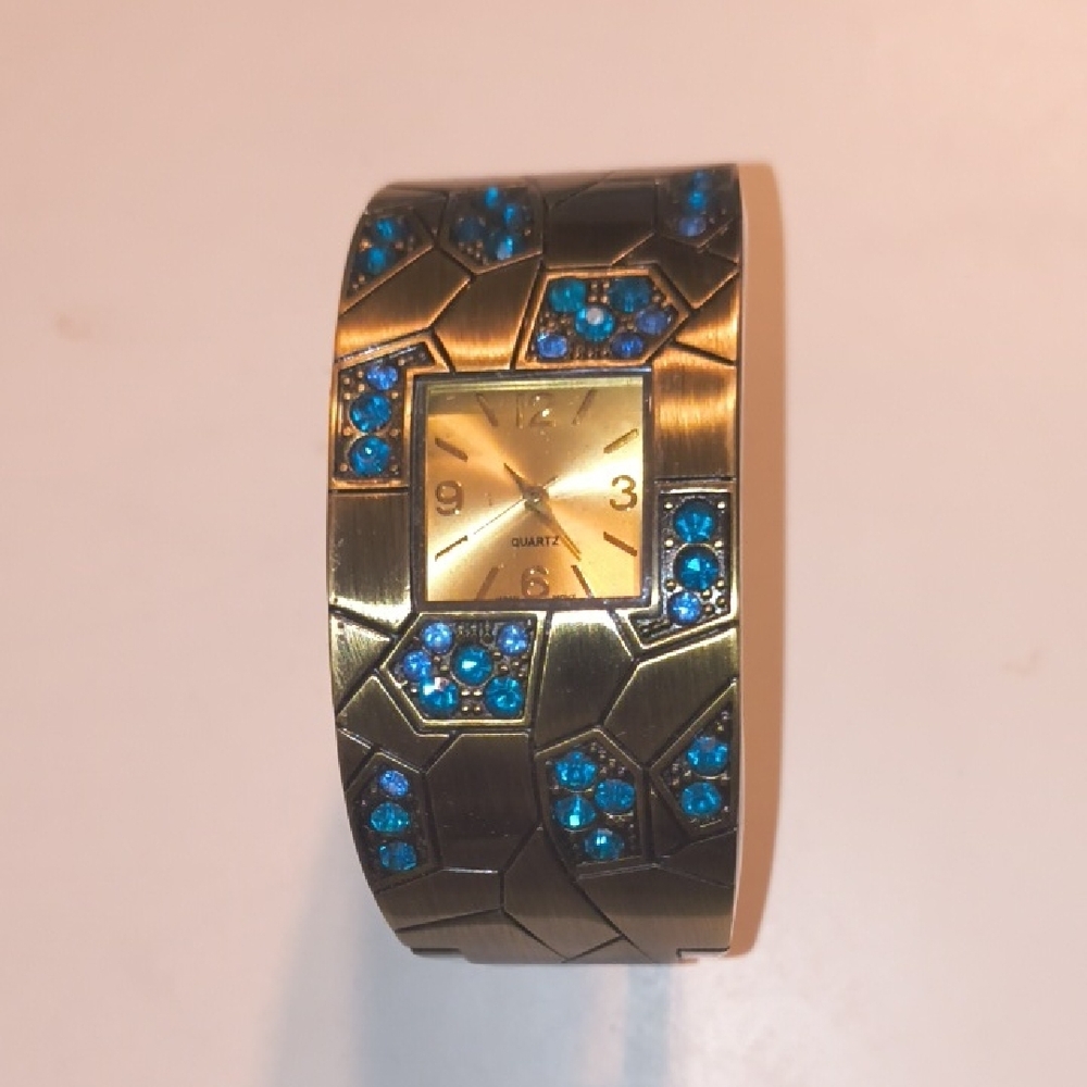 Avon Gold and Blue Women's Watch